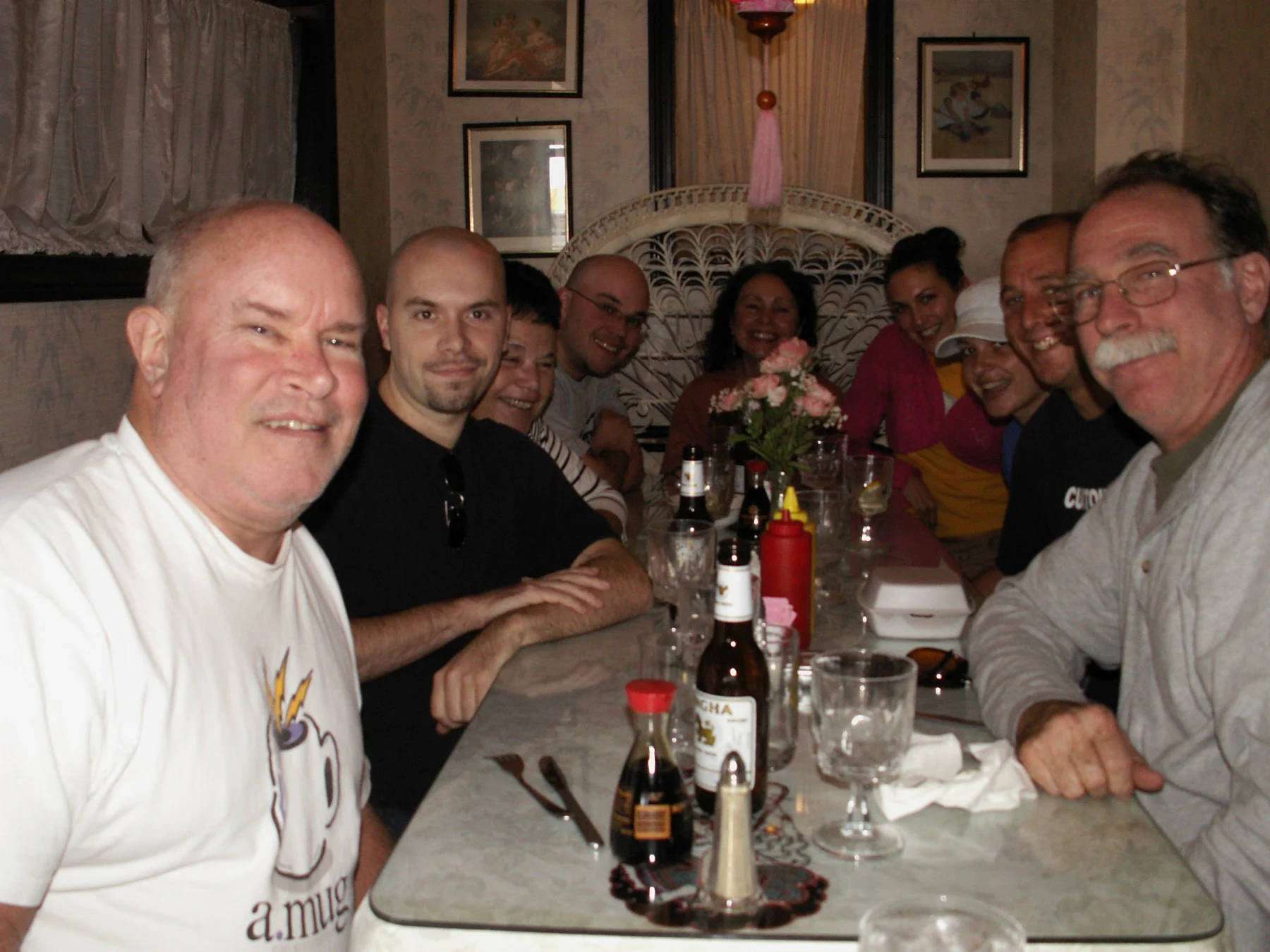 Harry gathered around a restaurant table with family and friends